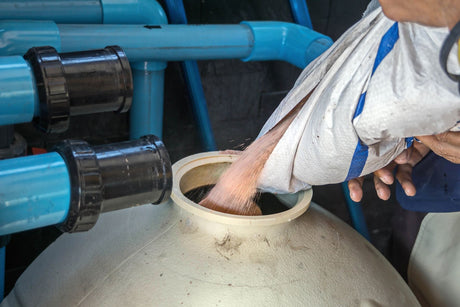men changing sand